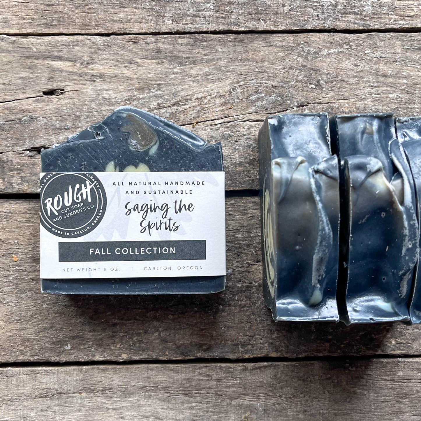 Bar of soap with packaging on a wooden surface