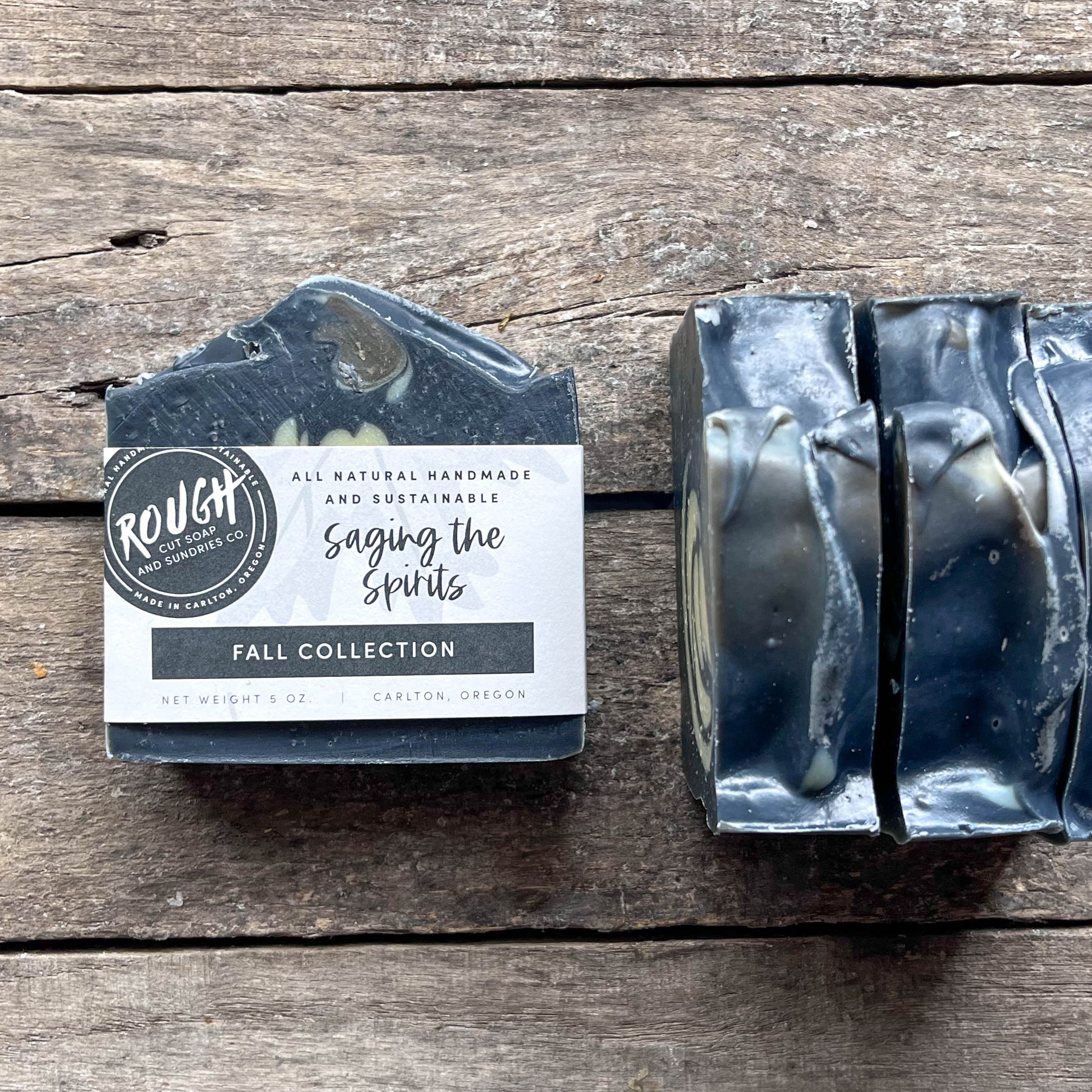 Bar of soap with packaging on a wooden surface